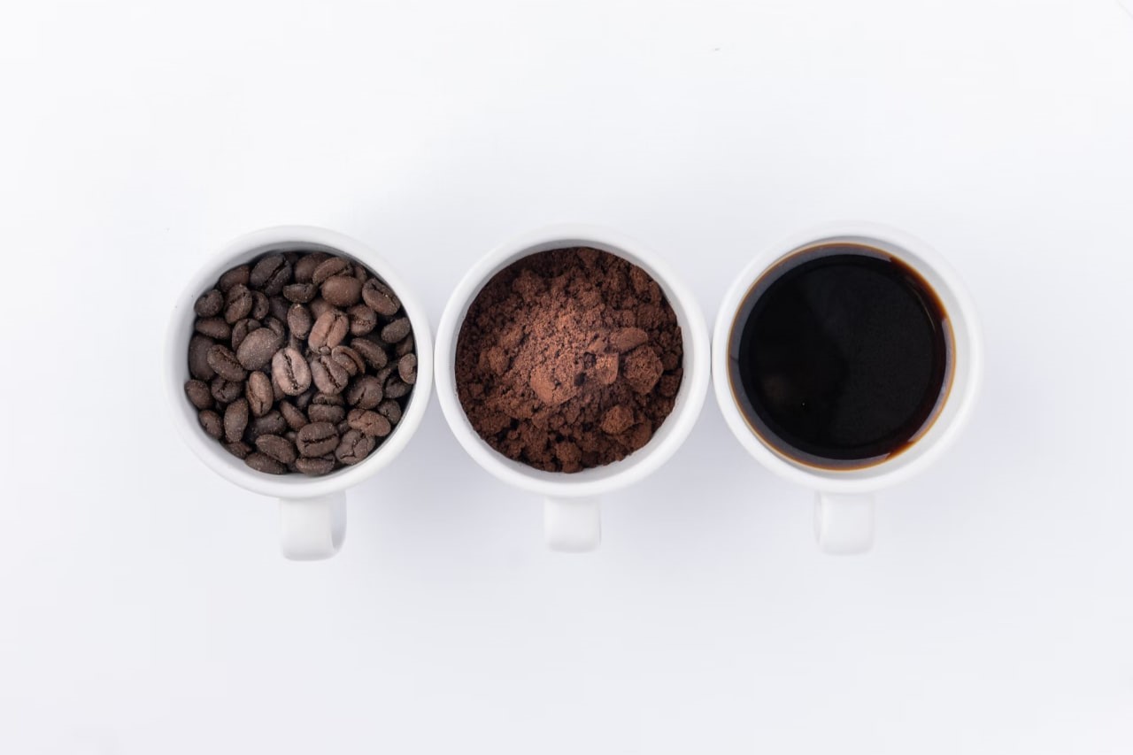 Coffee beans in a cup